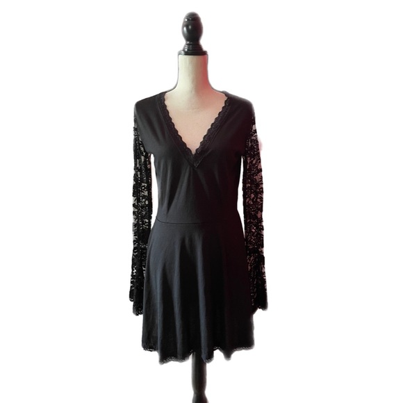 Dresses & Skirts - Vera’s Eyecandy Black Mini Dress with Lace Bell Sleeves
